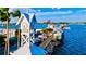 Scenic waterfront featuring a clock tower and pier overlooking the bay, showcasing a beautiful and peaceful coastal view at 1123 Riverscape St # D, Bradenton, FL 34208
