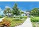 Community center building with lush landscaping at 11606 Apple Tree Cir, Bradenton, FL 34211