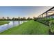 Lush yard with pond view at 11606 Apple Tree Cir, Bradenton, FL 34211
