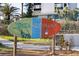 Siesta Key Village welcoming sign showcasing local attractions, shops, and community events at 1163 Coquille St # 207, Sarasota, FL 34242