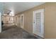 A spacious, unfinished garage featuring access doors and ample storage space at 1163 Coquille St # 207, Sarasota, FL 34242
