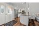 Beautiful kitchen featuring granite countertops, stainless steel appliances, and a stylish breakfast bar for casual dining at 1163 Coquille St # 207, Sarasota, FL 34242
