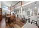 Open-concept living space showcasing a dining area, a modern kitchen, and elegant decor, perfect for entertaining at 1163 Coquille St # 207, Sarasota, FL 34242
