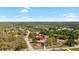 Expansive aerial shot showcasing the neighborhood's lush greenery surrounding the home at 12103 Shadow Run Blvd, Riverview, FL 33569