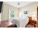 Cozy bedroom with a ceiling fan and natural light at 12103 Shadow Run Blvd, Riverview, FL 33569