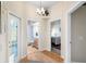 Hallway offering entrances to a bedroom, bathroom, and the exterior at 12103 Shadow Run Blvd, Riverview, FL 33569
