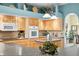 Well-equipped kitchen with modern appliances, a central island, and a breakfast nook for casual dining at 12103 Shadow Run Blvd, Riverview, FL 33569