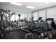 Bright fitness center equipped with treadmills, elliptical machines, weight machines, and free weights at 1219 Thornbury Dr, Parrish, FL 34219
