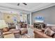 Cozy living room with hardwood floors and comfortable leather seating at 1219 Thornbury Dr, Parrish, FL 34219