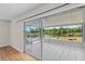 Enclosed porch with tile floors and a beautiful view of the lake at 1665 Harmony Dr, Port Charlotte, FL 33952