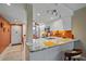 Kitchen with granite countertops, stainless steel appliances, and orange backsplash at 1701 Beach Rd # 312, Englewood, FL 34223