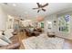 Open concept living area with updated kitchen and dining area at 22333 Panther Loop, Bradenton, FL 34202