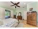 Light and bright main bedroom with wood flooring at 22333 Panther Loop, Bradenton, FL 34202
