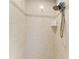 Tiled shower with decorative border and a rainfall shower head at 22333 Panther Loop, Bradenton, FL 34202