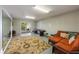 Recreation room features a pool table, comfortable seating, and sliding glass doors to an outdoor area at 2309 Avenue C # 100, Bradenton Beach, FL 34217