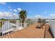 Roof deck with chairs perfect for enjoying the scenic views at 2309 Avenue C # 100, Bradenton Beach, FL 34217