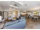 Spacious living room with stylish furniture and an open layout connecting to the kitchen and dining area at 2309 Avenue C # 200, Bradenton Beach, FL 34217