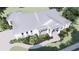 Aerial view of a well-maintained home featuring a gray roof, meticulous landscaping, and a brick driveway at 2508 Belvoir Blvd, Sarasota, FL 34237