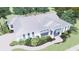 Bird's eye view of a cozy single Gathering home with a metal roof, landscaped yard, and paver driveway at 2508 Belvoir Blvd, Sarasota, FL 34237