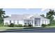 An elegant single-story home boasting a gray metal roof with a beautifully landscaped front yard at 2508 Belvoir Blvd, Sarasota, FL 34237