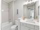 Well-lit bathroom with a bathtub, shower, and single vanity, designed for comfort and functionality at 2894 Butterfly Jasmine Trl, Sarasota, FL 34240