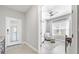 Bright office with large window, ceiling fan, neutral paint, and tile flooring at 2894 Butterfly Jasmine Trl, Sarasota, FL 34240