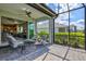 Inviting outdoor patio with comfortable seating and a seamless transition to the indoors at 2894 Butterfly Jasmine Trl, Sarasota, FL 34240