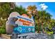 Anna Maria Island sign featuring a manatee and palm trees at 2894 Butterfly Jasmine Trl, Sarasota, FL 34240