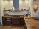 Well-appointed kitchen featuring granite counters, stainless steel appliances, and stylish decor at 33 Tee View Pl, Rotonda West, FL 33947