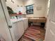 Bright laundry room with modern appliances and ample storage space at 33 Tee View Pl, Rotonda West, FL 33947