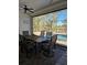 Patio with a table and view of a pool at 33 Tee View Pl, Rotonda West, FL 33947