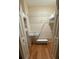 Spacious walk-in closet with shelving, hanging rod, and shoe storage at 33 Tee View Pl, Rotonda West, FL 33947