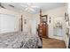 Spacious main bedroom boasting carpet floors and ensuite access to the bathroom at 3883 Tampico Dr, Sarasota, FL 34235