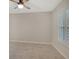 Well-lit bedroom featuring tile floors, window shutters, and a ceiling fan at 3950 Oakley Greene # 36, Sarasota, FL 34235