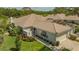 Charming single-story home with manicured lawn and lush landscaping, offering great curb appeal at 3950 Oakley Greene # 36, Sarasota, FL 34235