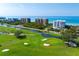 Coastal condos overlooking golf course with Gulf of Mexico views and private beach access at 435 L Ambiance Dr # H902, Longboat Key, FL 34228