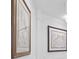 Close-up of decorative wall art with an elegant white wall background at 435 L Ambiance Dr # H902, Longboat Key, FL 34228
