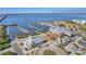 Aerial shot of a waterfront property featuring a marina, restaurants, and easy water access at 435 La Sila Ct, Punta Gorda, FL 33950