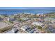Aerial view capturing downtown area and marina, creating a picturesque scene with a mix of commercial and residential buildings at 435 La Sila Ct, Punta Gorda, FL 33950