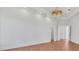 Large bedroom featuring hardwood floors, recessed lighting, and tray ceilings at 435 La Sila Ct, Punta Gorda, FL 33950