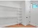 Walk-in closet with shelving units and a window at 435 La Sila Ct, Punta Gorda, FL 33950