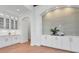 Refined dining area featuring custom cabinetry, modern finishes, and seamless transition to kitchen at 435 La Sila Ct, Punta Gorda, FL 33950