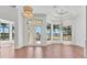 Bright foyer with high ceilings, large windows, and stylish lighting fixtures at 435 La Sila Ct, Punta Gorda, FL 33950