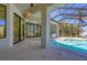 Covered lanai boasts a beautiful pool, outdoor kitchen and serene views at 435 La Sila Ct, Punta Gorda, FL 33950