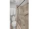 Bathroom featuring tiled walk-in shower, and modern fixtures at 4420 Tecumseh Trl # 38, Sarasota, FL 34233