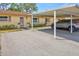 Charming home with a covered parking area and well-manicured landscaping, offering convenience and curb appeal at 4420 Tecumseh Trl # 38, Sarasota, FL 34233