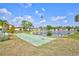 Recreational shuffleboard court by the lake, offering a scenic and enjoyable outdoor activity at 4420 Tecumseh Trl # 38, Sarasota, FL 34233