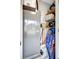 Storage area featuring shelving for organizing household items and cleaning supplies at 4420 Tecumseh Trl # 38, Sarasota, FL 34233