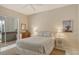 Bright bedroom with view to the lanai at 4444 Highland Oaks Cir, Sarasota, FL 34235