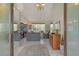 Bright living room featuring high ceilings and tile flooring at 4444 Highland Oaks Cir, Sarasota, FL 34235